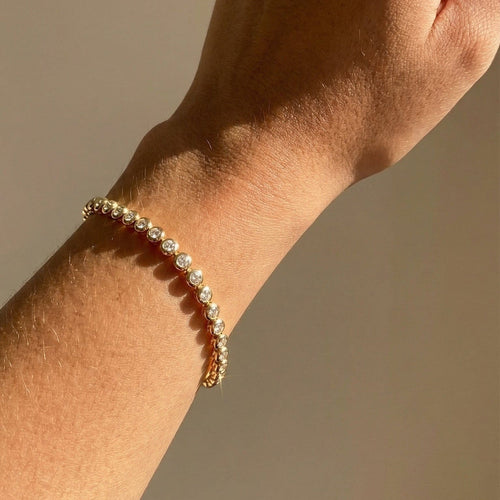 Bracelet Bracelet tennis - Bracelet en or jaune 14 carats et diamants 0,75 ct 58 Facettes