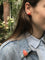 Broche Broche Art déco belge en or jaune 18 ct, corail et onyx 58 Facettes 10015-4334