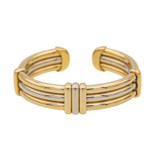 Bracelet O.J. Perrin - Bracelet rigide bicolore en or jaune et blanc 58 Facettes 1050174CN