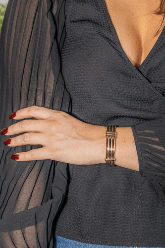 Bracelet O.J. Perrin - Bracelet rigide bicolore en or jaune et blanc 58 Facettes 1050174CN