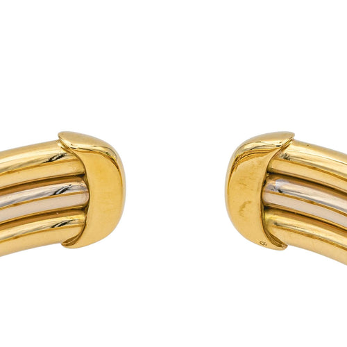 Bracelet O.J. Perrin - Bracelet rigide bicolore en or jaune et blanc 58 Facettes 1050174CN