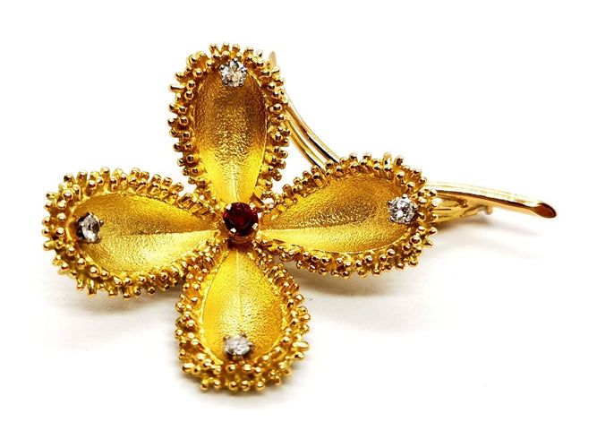 Broche Broche fleur vintage en or jaune 18 carats rubis et diamants 58 Facettes 1089906CD
