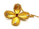 Broche Broche fleur vintage en or jaune 18 carats rubis et diamants 58 Facettes 1089906CD