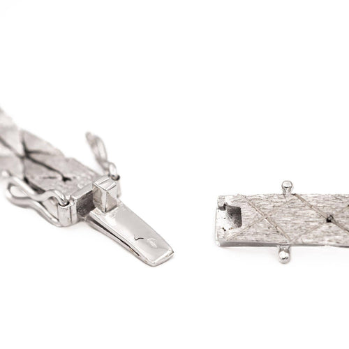 Bracelet Bracelet vintage motif feuillage en or blanc 18 carats, diamants et perles 58 Facettes 1142143CN