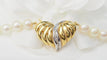 Collier Collier en or jaune 18 ct et perles de culture, pendentif cœur diamants 58 Facettes 32956