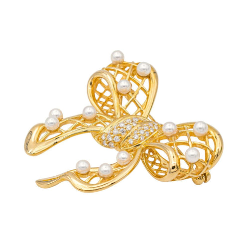 Broche Broche Noeud Or jaune Perle, Diamant 58 Facettes 1653935CN