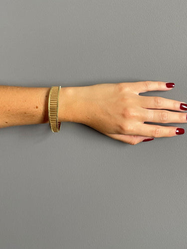 Bracelet Bracelet manchette vintage en or jaune 18 carats 58 Facettes 1670516CN