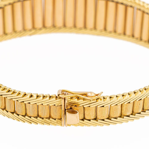 Bracelet Bracelet manchette vintage en or jaune 18 carats 58 Facettes 1670516CN