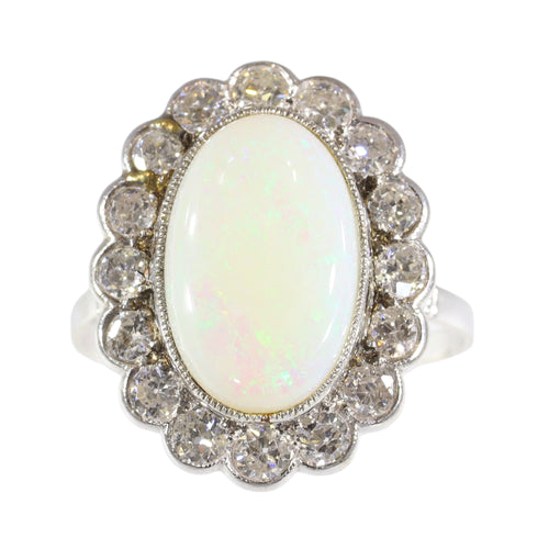 17226-0017.p03_Classic Elegance  The Timeless Appeal of a Vintage 1950s Opal Ring-en.jpg