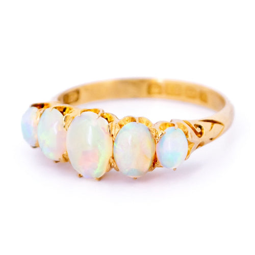 Bague 55 Bague cinq pierres en or jaune 18 carats et opales 58 Facettes 3613F170ED024DF7983473E9C4472394