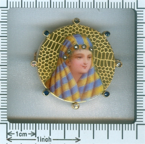 Broche Broche motif femme bédouine en or jaune 18K, diamants et saphirs 58 Facettes 18079-0229