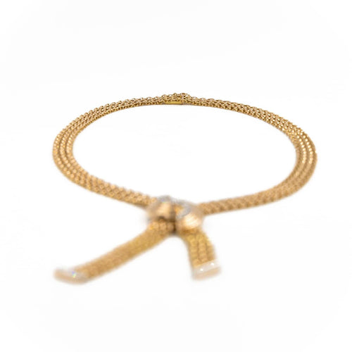 Collier Collier négligé en or jaune et platine serti de diamants 58 Facettes 1986222CN
