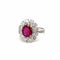 Bague 52 Bague en or blanc 18k avec rubis ovale 2,07 ct et diamants 58 Facettes
