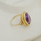 Bague 67 Bague vintage en or jaune 14K avec améthyste ovale 58 Facettes 3135
