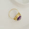 Bague 67 Bague vintage en or jaune 14K avec améthyste ovale 58 Facettes 3135