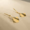 Boucles d'oreilles Boucles d’oreilles pendantes Ginkgo vintage en or 14 carats 58 Facettes 3155