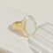 Bague 58 Bague vintage en or jaune 14K avec opale et diamants 58 Facettes 2354
