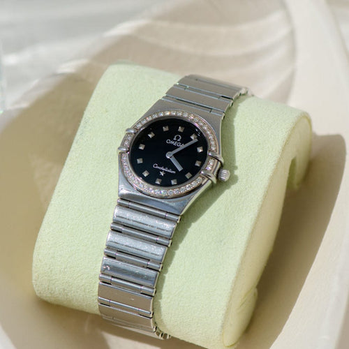 Montre Omega Constellation - Montre femme en acier inoxydable avec lunette diamantée 58 Facettes 1923