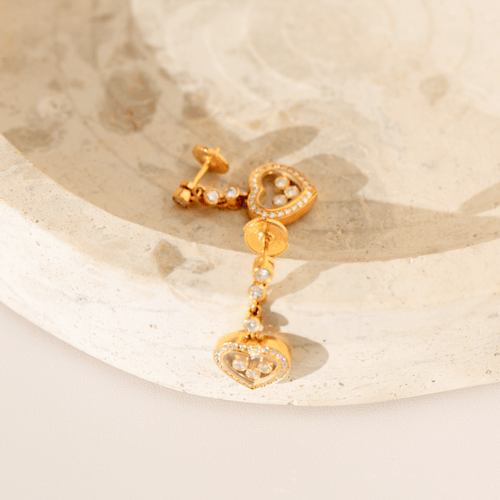 Boucles d'oreilles Chopard Happy Diamonds - Boucles d’oreilles en or jaune 18 carats et diamants 58 Facettes 3285