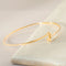 Armreif en or jaune 18 carats avec 12 diamants 58 Facettes