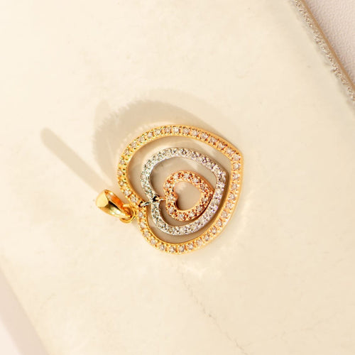 Pendentif Pendentif cœur tricolore en or 14 carats et diamants 58 Facettes
