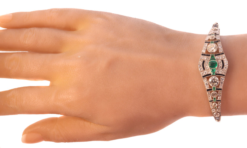Bracelet Bracelet Art déco en platine avec diamants, émeraudes et onyx 58 Facettes 20358-0165
