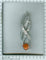 Pendentif Pendentif vintage flamme en platine avec opale de feu et diamants 58 Facettes 21028-0244