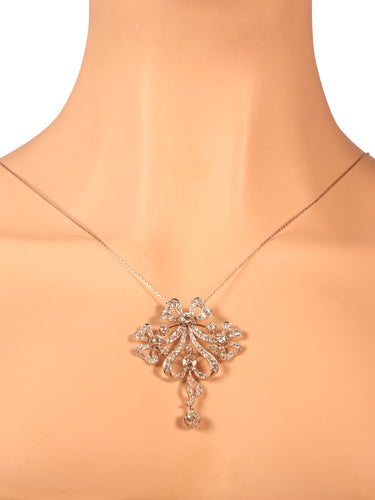 Pendentif Belle Époque - Broche-pendentif convertible nœud en platine et diamants 58 Facettes 22152-0220
