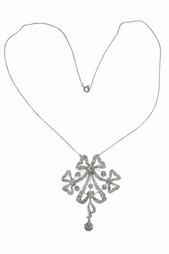 Pendentif Belle Époque - Broche-pendentif convertible nœud en platine et diamants 58 Facettes 22152-0220