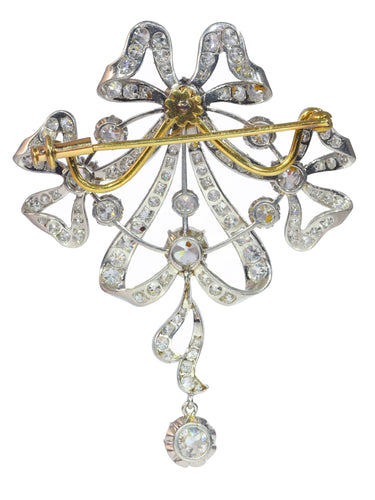 Pendentif Belle Époque - Broche-pendentif convertible nœud en platine et diamants 58 Facettes 22152-0220