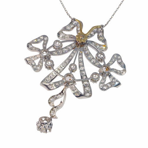 Pendentif Belle Époque - Broche-pendentif convertible nœud en platine et diamants 58 Facettes 22152-0220