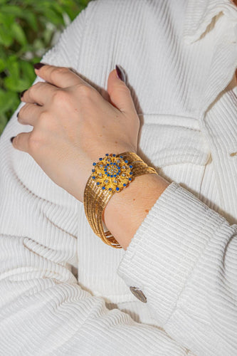 Bracelet Bracelet manchette en or jaune 18 carats, diamants et saphirs 58 Facettes 2331748CN