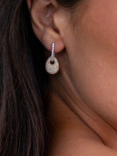 Boucles d'oreilles Boucles d’oreilles dormeuses en or rose et or blanc 18 carats, diamants 58 Facettes 2397518CN
