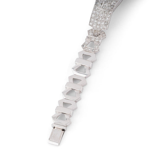 Montre Montre Art Déco ovale en platine et diamants 2,50 cts 58 Facettes 1