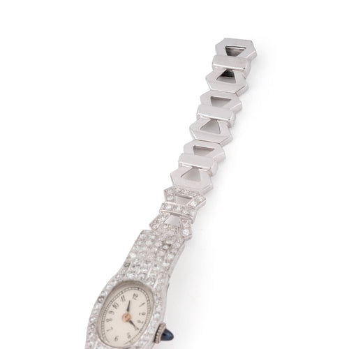 Montre Montre Art Déco ovale en platine et diamants 2,50 cts 58 Facettes 1