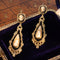 Boucles d'oreilles Boucles d’oreilles camées victoriennes pendantes en or jaune 18K 58 Facettes 24278-0417