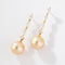 Boucles d'oreilles Boucles d'oreilles pendantes en or jaune, diamants et perle des mers du Sud 58 Facettes 1