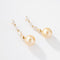Boucles d'oreilles Boucles d'oreilles pendantes en or jaune, diamants et perle des mers du Sud 58 Facettes 1