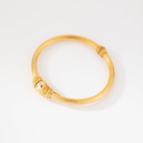 Bracelet Lalaounis - Bracelet jonc ciselé en or jaune 22K 58 Facettes 1