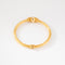 Bracelet Lalaounis - Bracelet jonc ciselé en or jaune 22K 58 Facettes 1