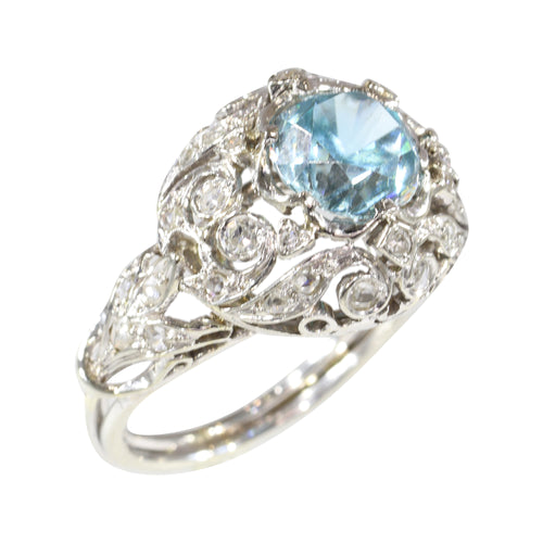 Bague 53 Bague vintage en platine avec zircon bleu – Élégance du milieu du siècle dans un design ajouré 58 Facettes 25115-0283