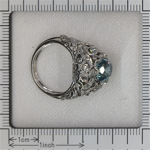 Bague 53 Bague vintage en platine avec zircon bleu – Élégance du milieu du siècle dans un design ajouré 58 Facettes 25115-0283