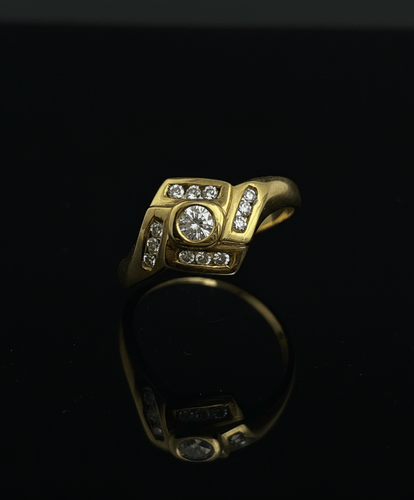 Bague Bague romboïdale années 1990 en or jaune 18 carats et diamants 58 Facettes