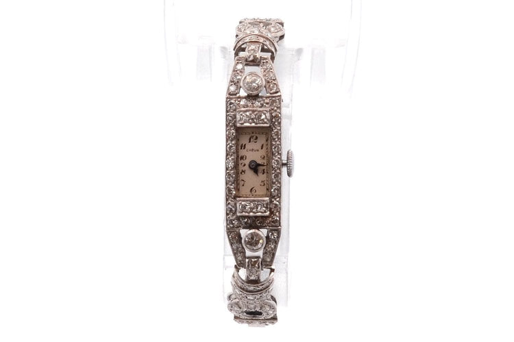 Montre Montre Art déco en platine sertie de diamants 58 Facettes 26087