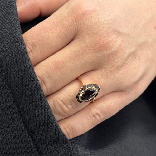 Bague Bague halo en or rose 18 ct avec grenats 58 Facettes 26868