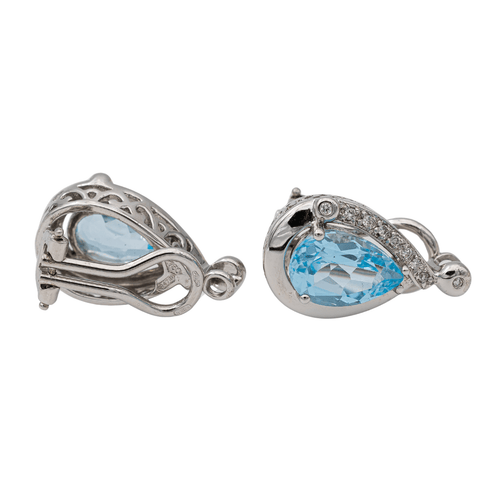 Boucles d'oreilles Boucles d’oreilles clips en or blanc 18 carats topazes et diamants 58 Facettes 2718242CN