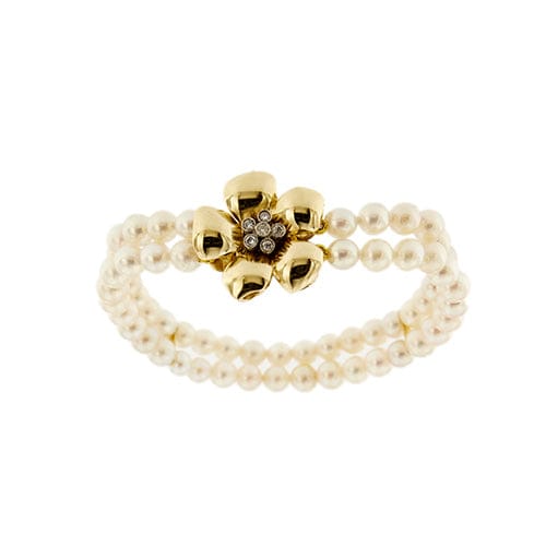 Bracelet Bracelet double rang de perles et diamants en or jaune 18 carats 58 Facettes 27351
