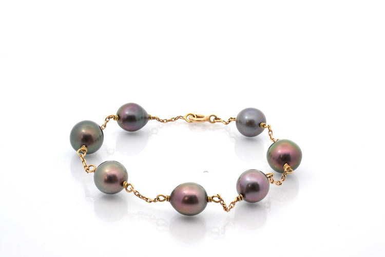 Bracelet Bracelet en or 18 carats avec perles de culture de Tahiti 58 Facettes 27723