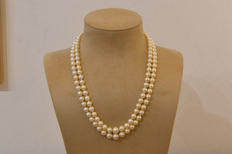 Collier Collier de perles de culture avec fermoir en or blanc 18k 58 Facettes 27807