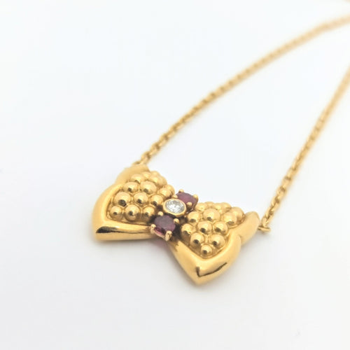 Collier Fred - Collier Nœud en or jaune, diamant et rubis 58 Facettes 28068